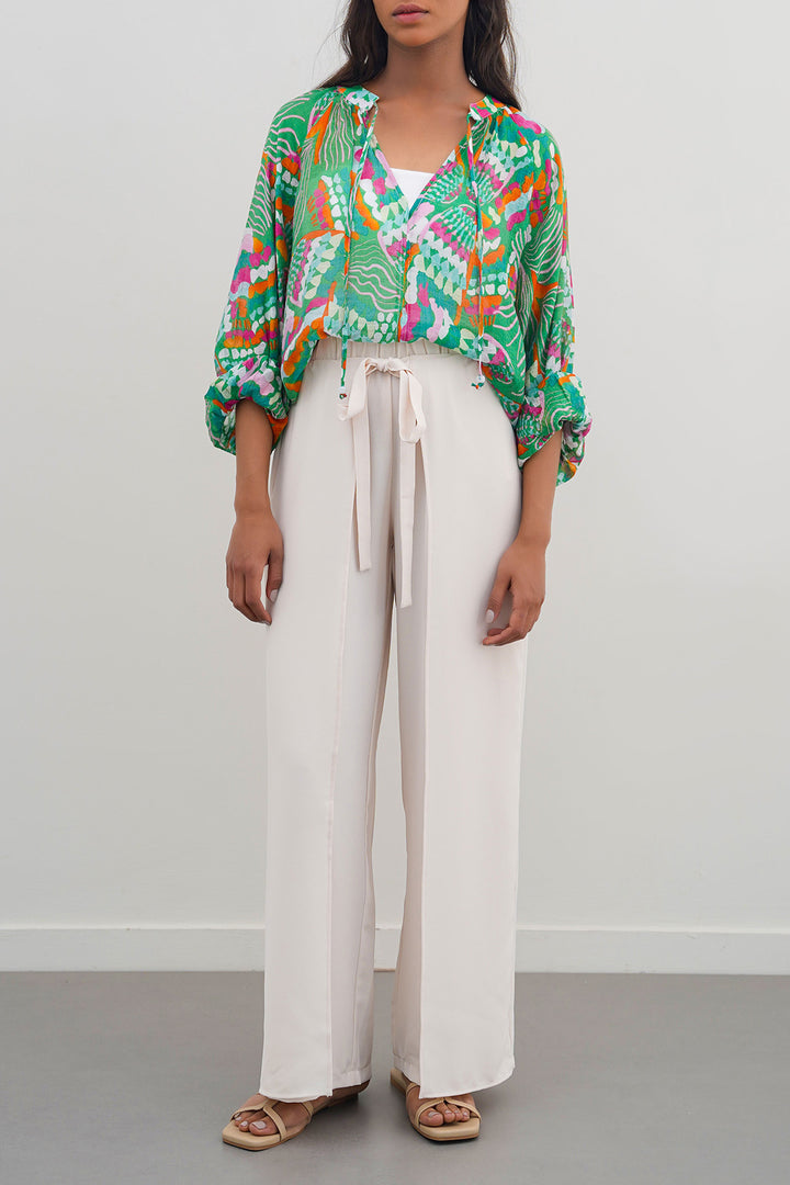 CREAM TIE-AROUND RESORT PANTS