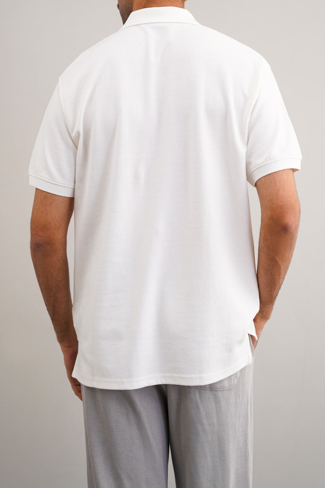 WHITE QUARTER ZIP POLO