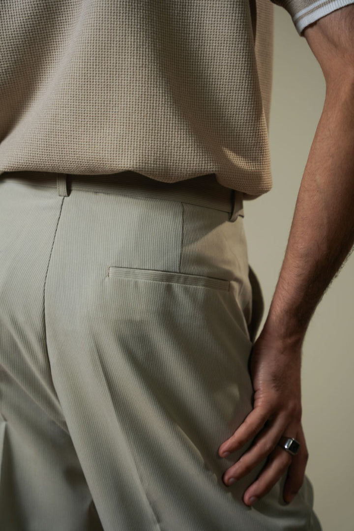 BEIGE SIGNATURE BELTED PANTS