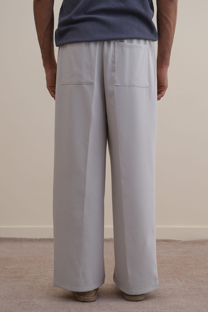 IVORY PLEATED PANTS