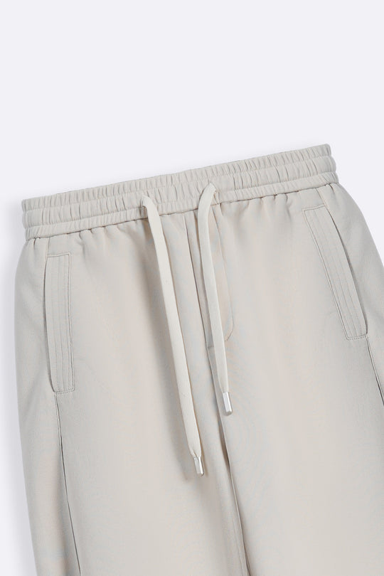 BEIGE PANELLED BARREL PANTS