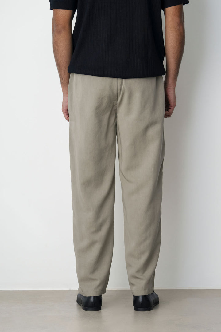 BEIGE RELAXED FIT PLEATED PANTS