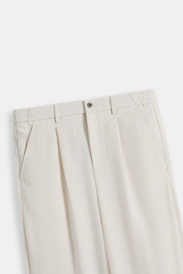 IVORY RELAXED FIT PLEATED PANTS