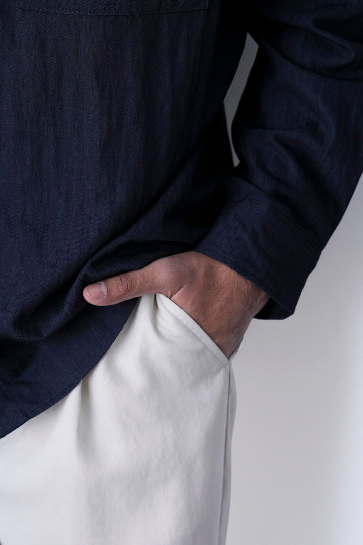 IVORY RELAXED FIT PLEATED PANTS
