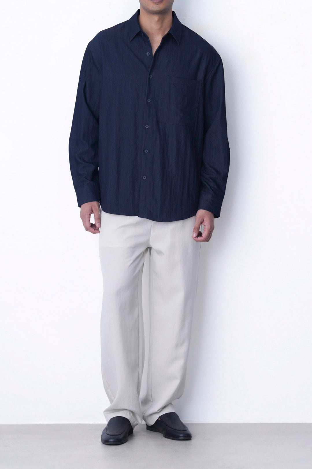 IVORY RELAXED FIT PLEATED PANTS