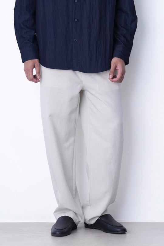 IVORY RELAXED FIT PLEATED PANTS