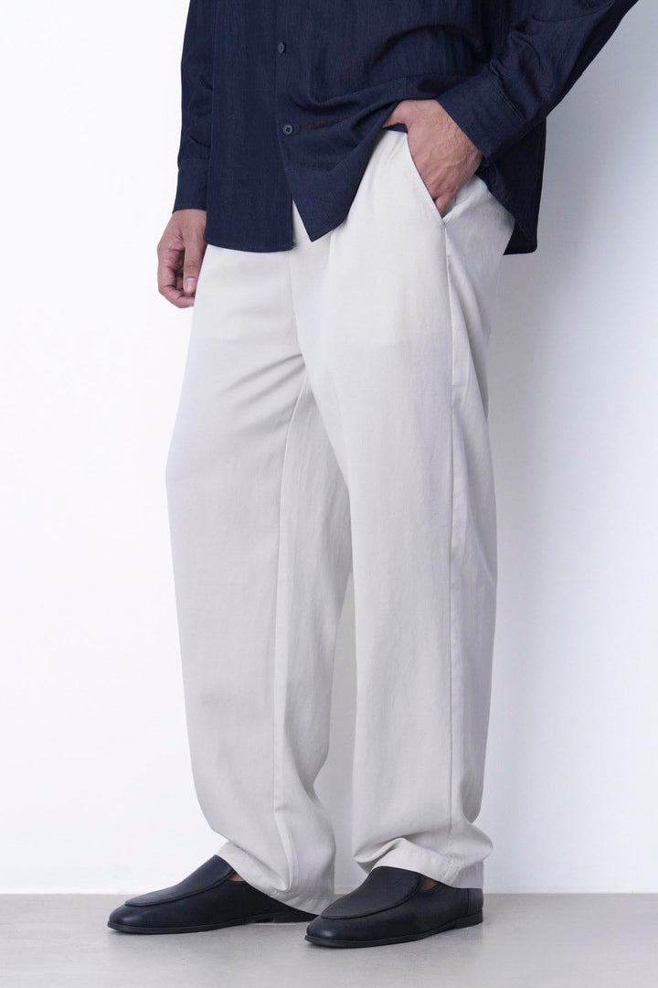 IVORY RELAXED FIT PLEATED PANTS