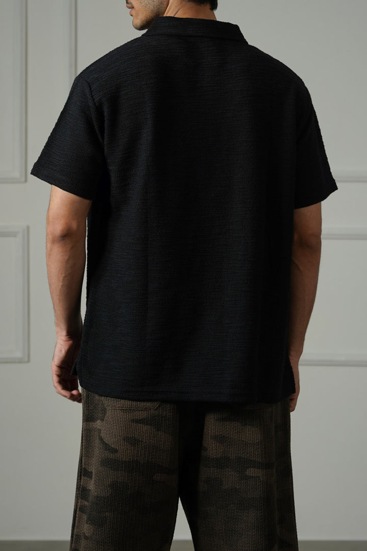 BLACK TEXTURED ZIPPER POLO