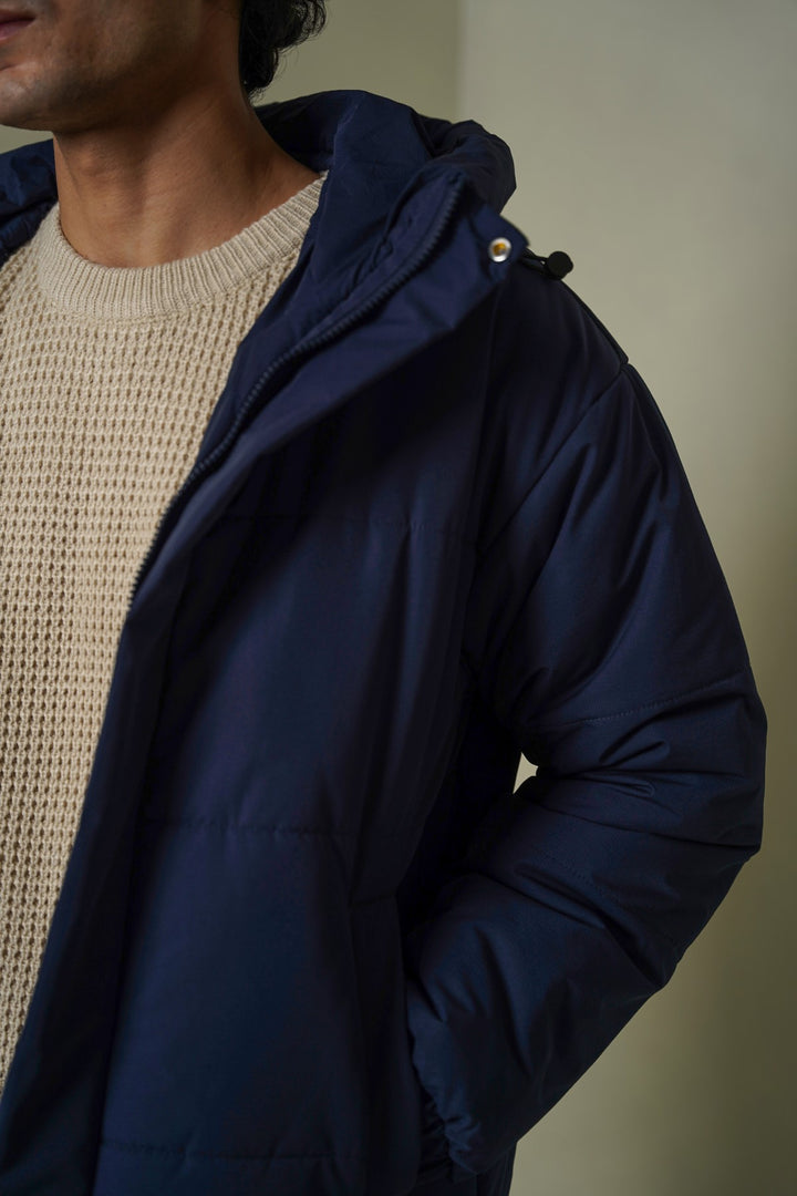 NAVY HOODED PUFFER JACKET