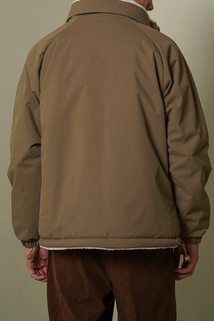 BROWN REVERSIBLE SHERPA PUFFER