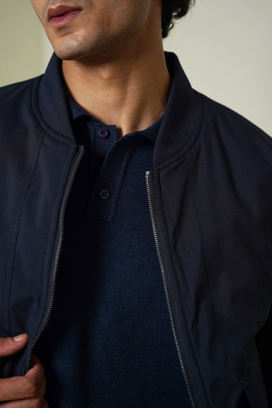 NAVY REVERSIBLE BOMBER JACKET