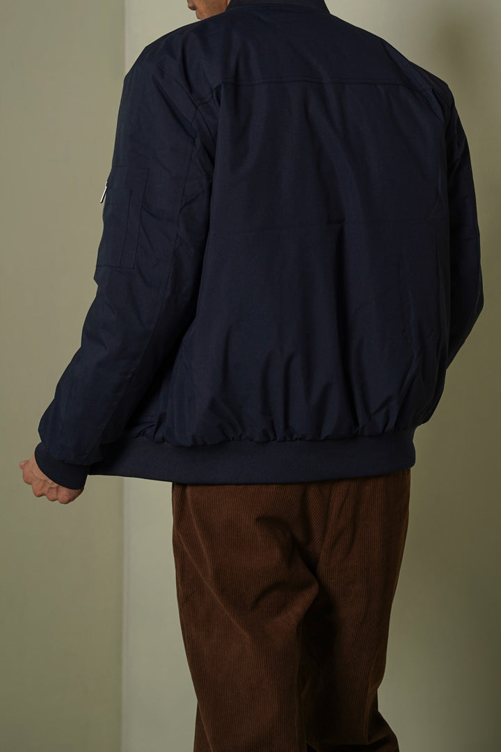 NAVY REVERSIBLE BOMBER JACKET