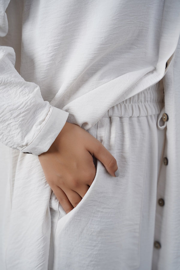 CREAM SLINKY WIDE LEG PANTS