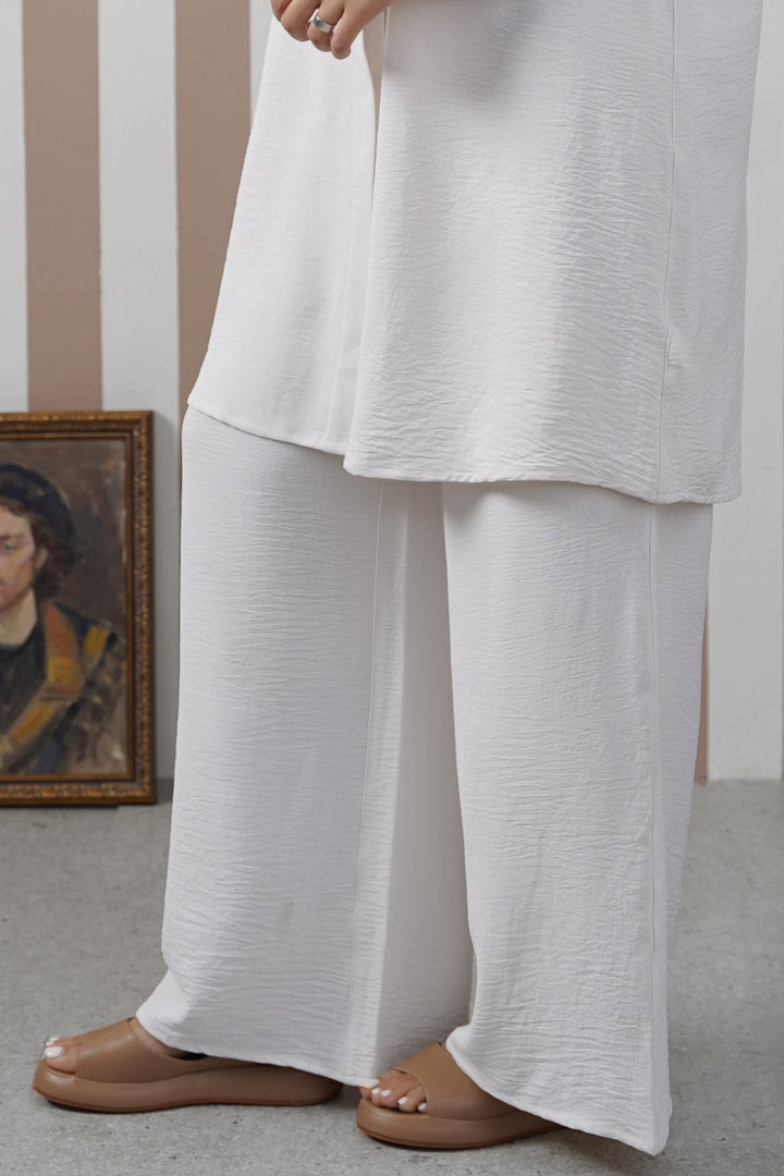 CREAM SLINKY WIDE LEG PANTS