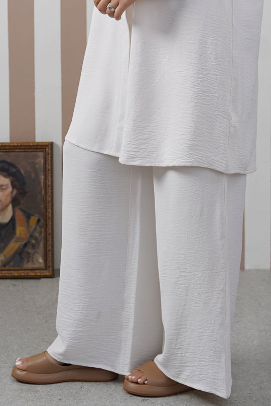 CREAM SLINKY WIDE LEG PANTS