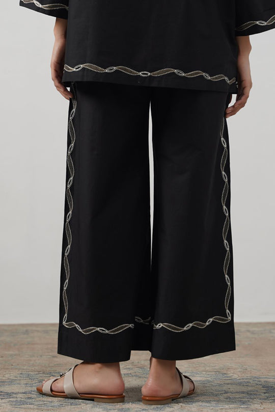 BLACK COSMOS EMBROIDERED PANTS