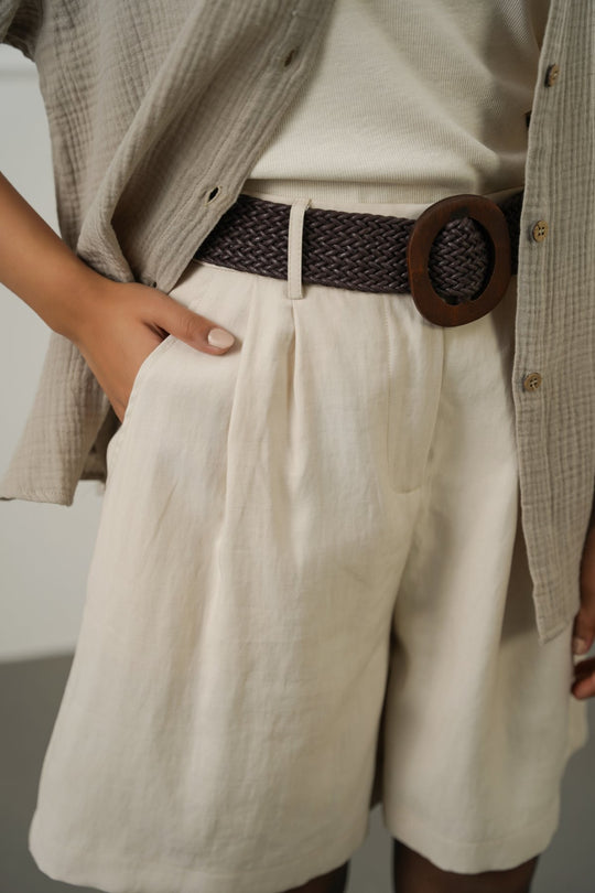 CREAM BELTED PLEAT SHORTS