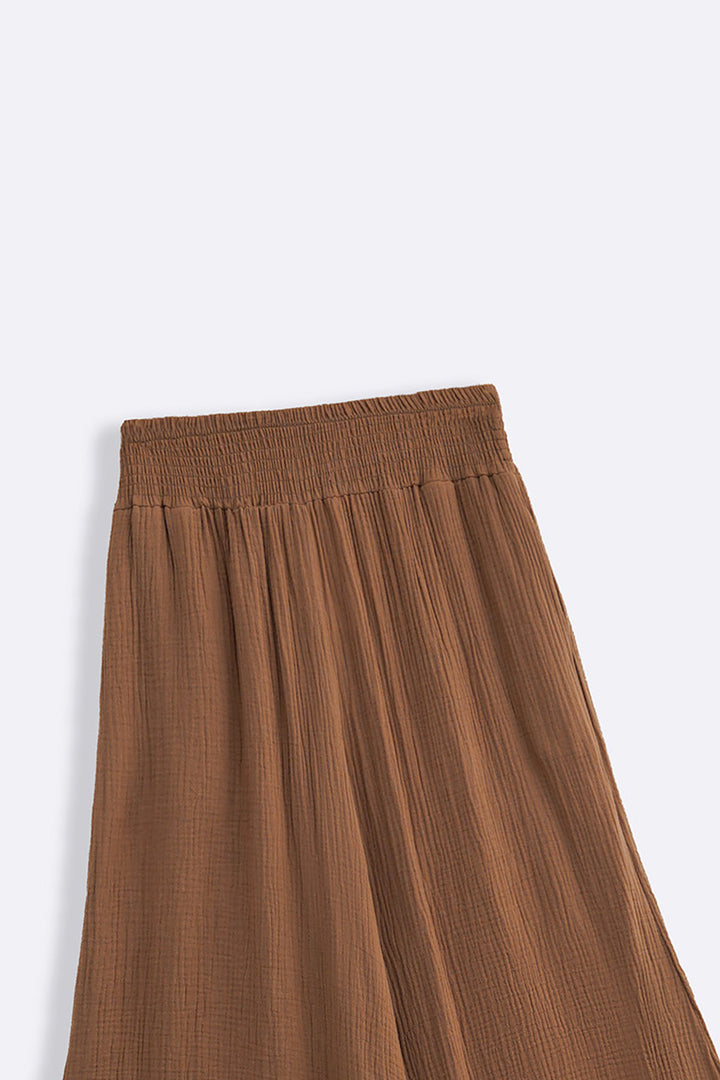 BROWN SMOCKED WAIST MUSLIN PANTS