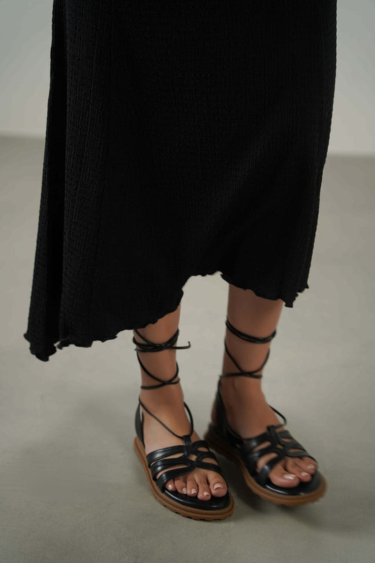 BLACK ASYMMETRIC CRINKLE SKIRT
