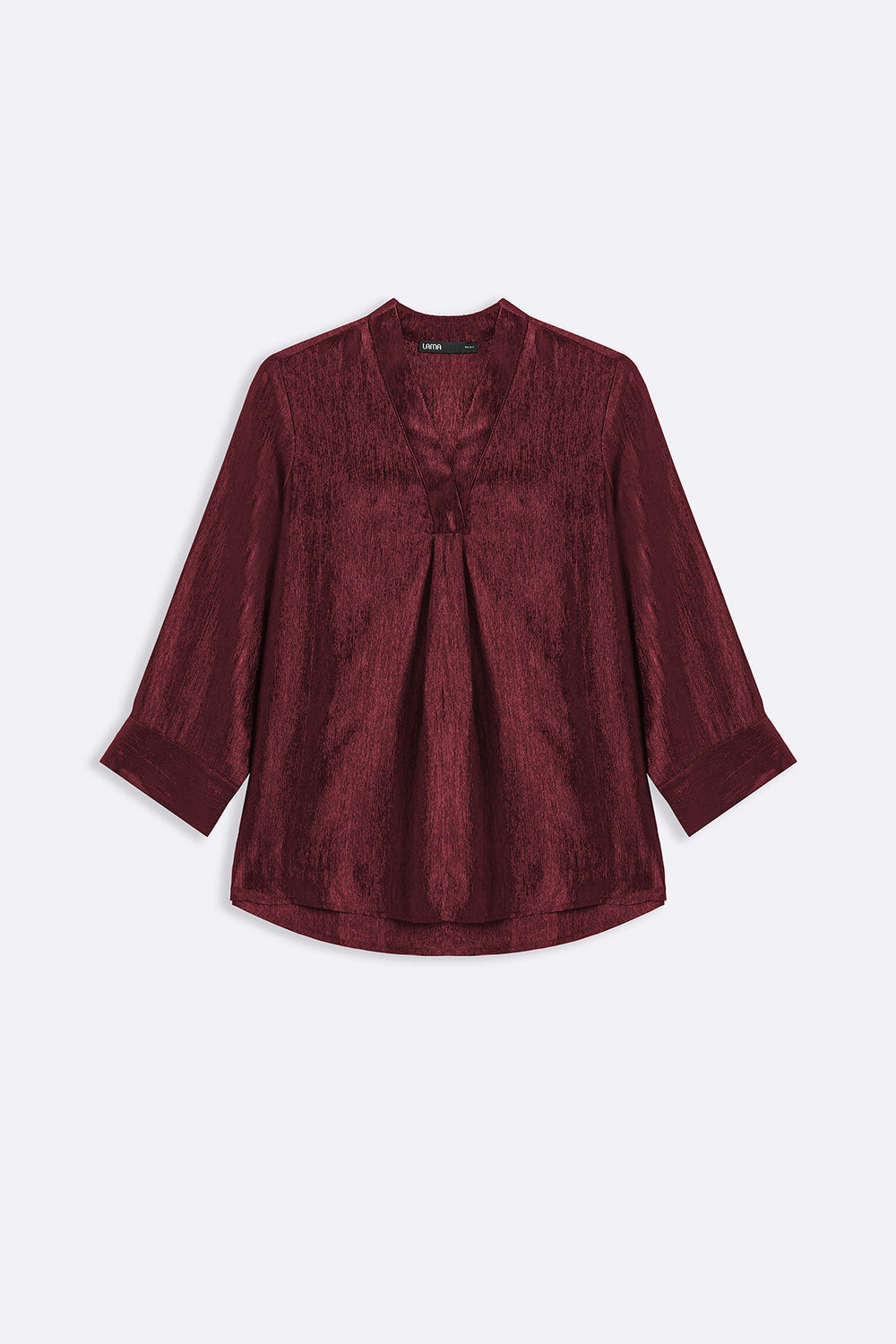 RUST TEXTURED FLOWY V NECK TOP