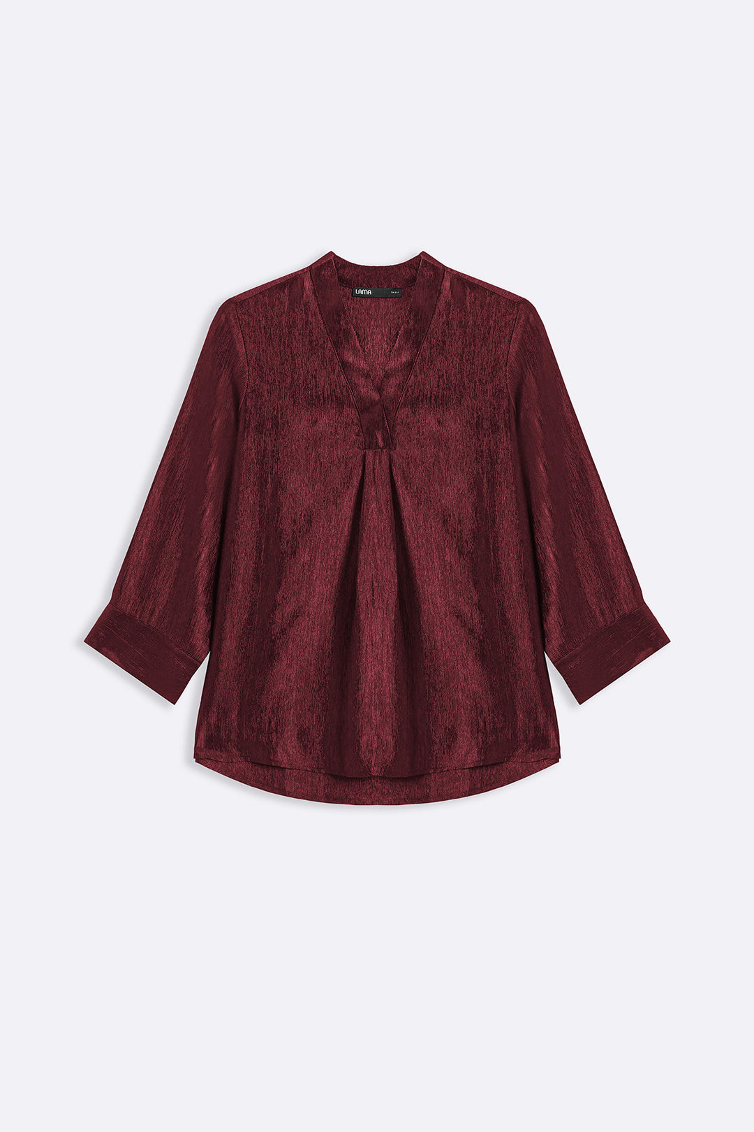 RUST TEXTURED FLOWY V NECK TOP
