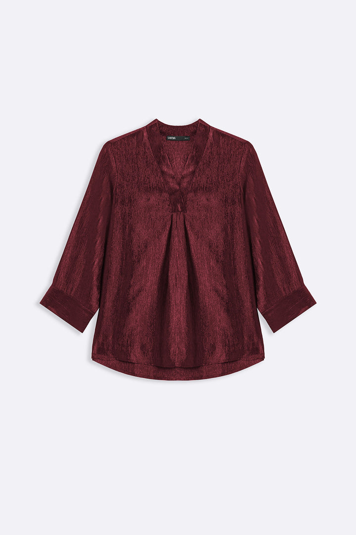 RUST TEXTURED FLOWY V NECK TOP