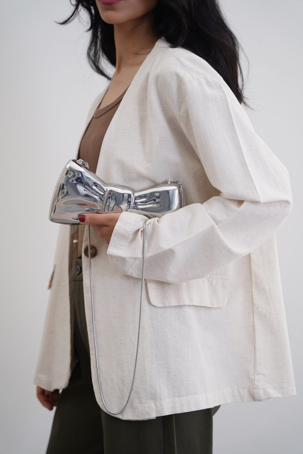 SILVER BOWTIE METAL CLUTCH