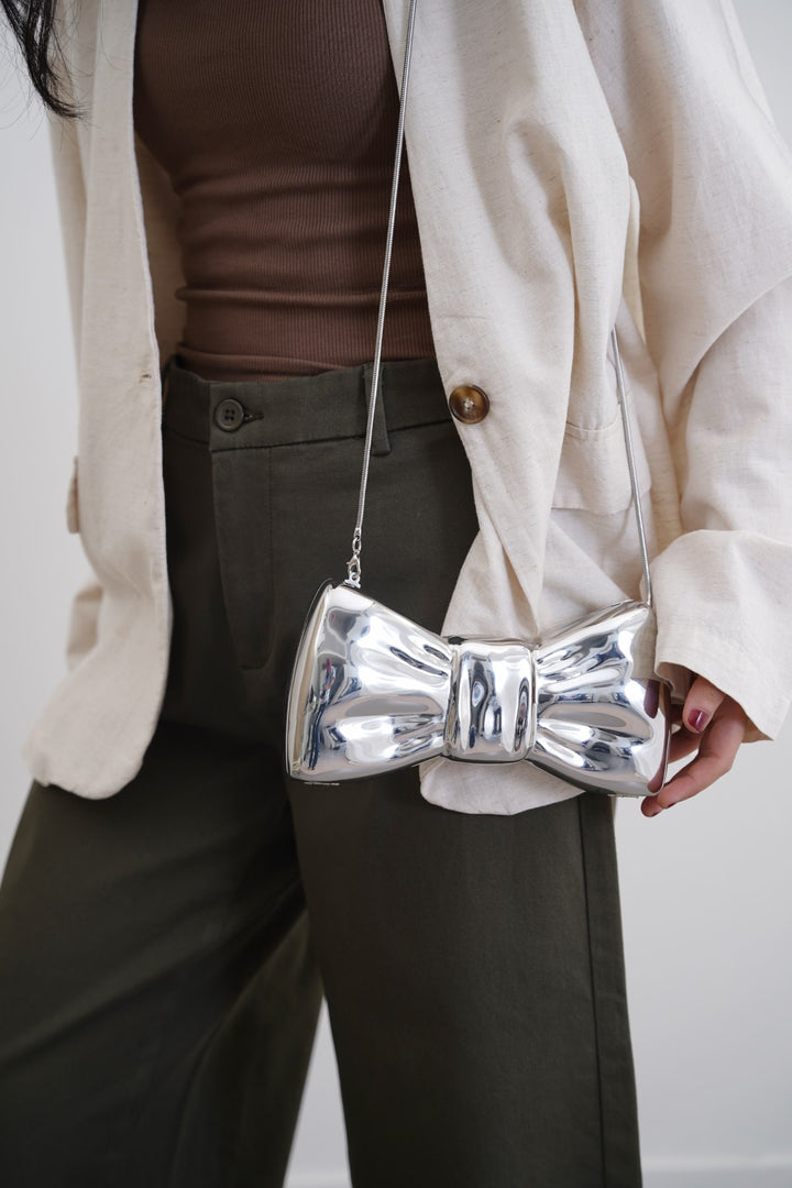 SILVER BOWTIE METAL CLUTCH