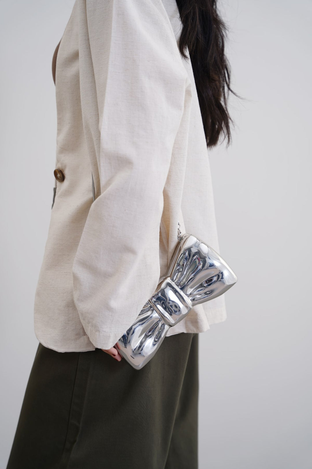 SILVER BOWTIE METAL CLUTCH