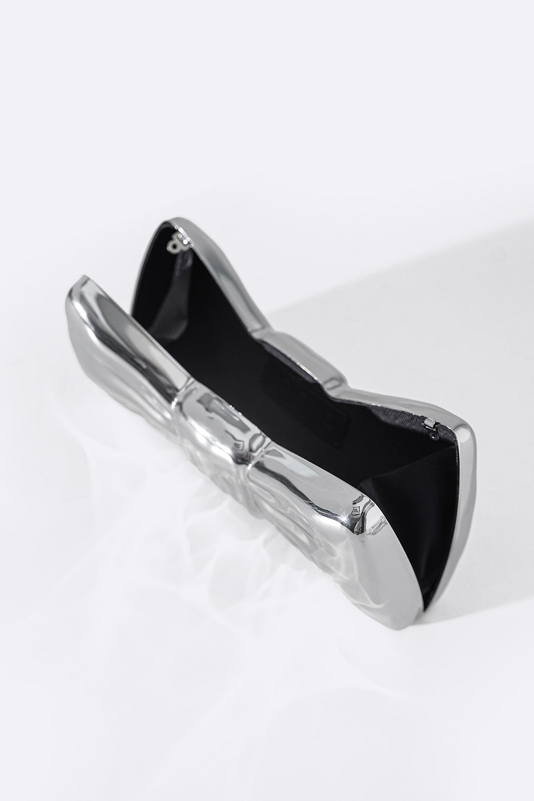 SILVER BOWTIE METAL CLUTCH