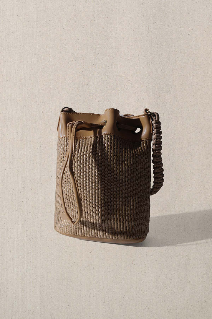 LIGHT BROWN THE CARAVAN BUCKET BAG