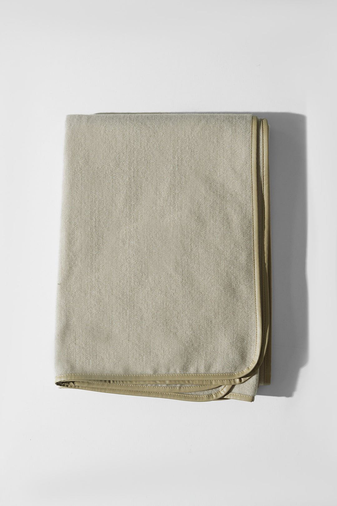 CREAM EDGE LINED CAPE