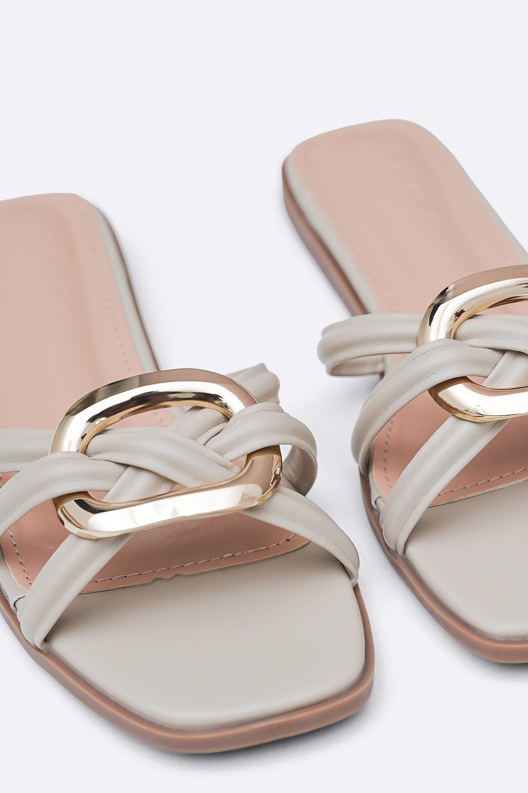 BEIGE DREW BUCKLE SLIDES