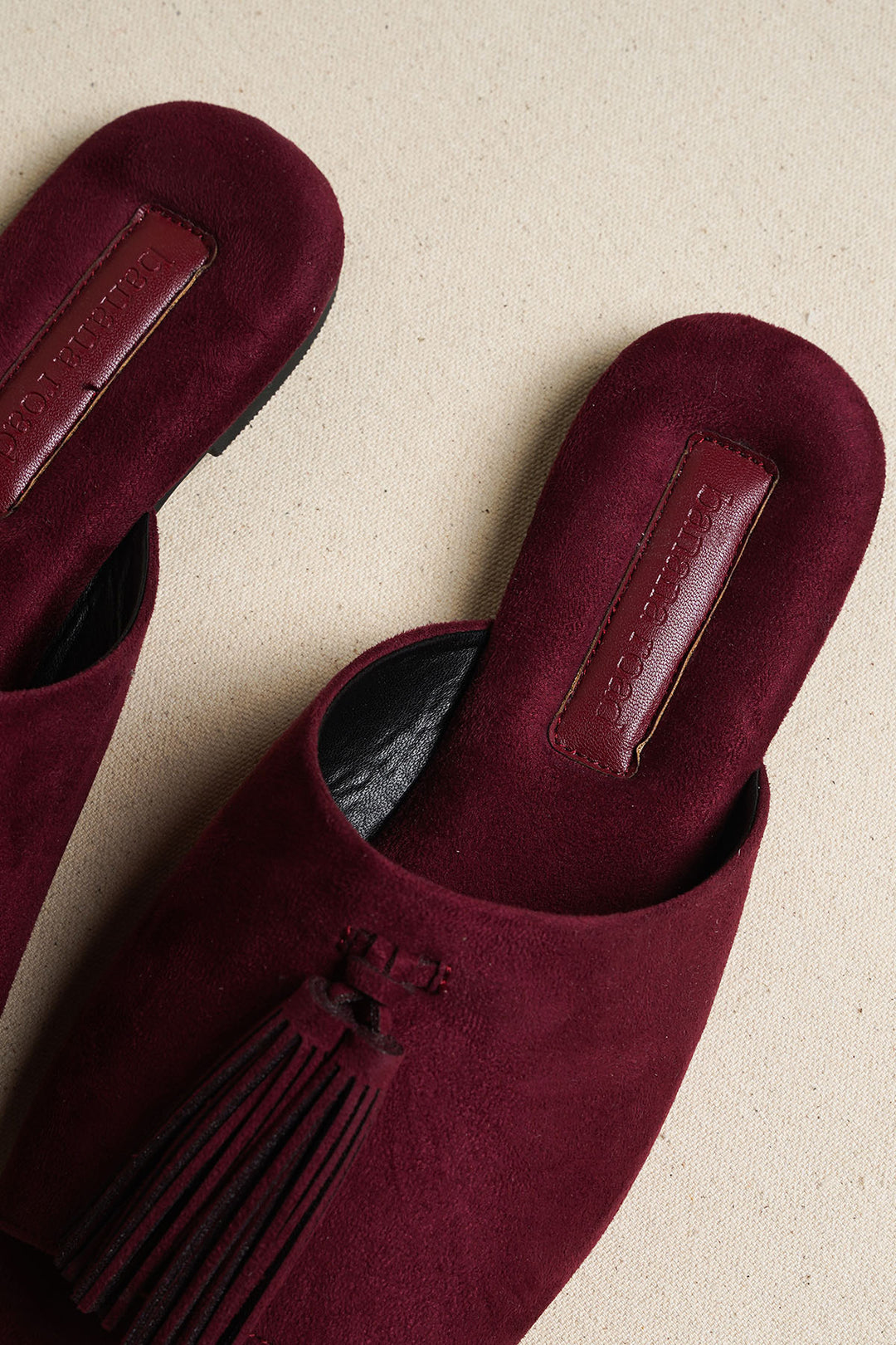 PLUM TROPIC TASSEL SLIDES